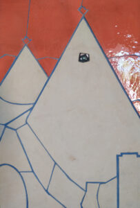 Trulli II. Leccese stone, ceramic and grout on panel. Cm 48x70. 2022